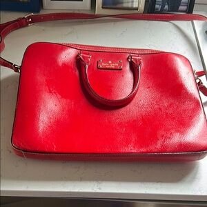 Kate Spade Red Laptop Bag with Sleek Design